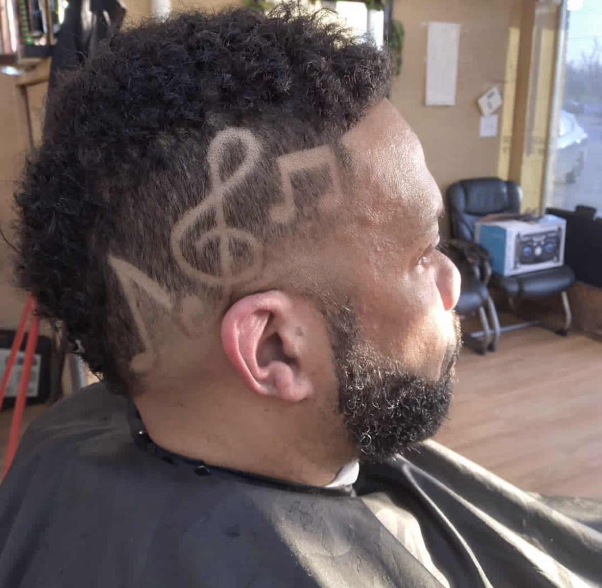 Custom music-themed hair design